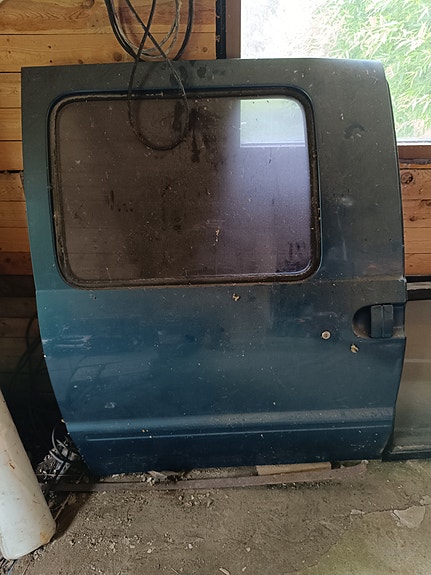 Volkswagen pakettiauton sivuovi sininen