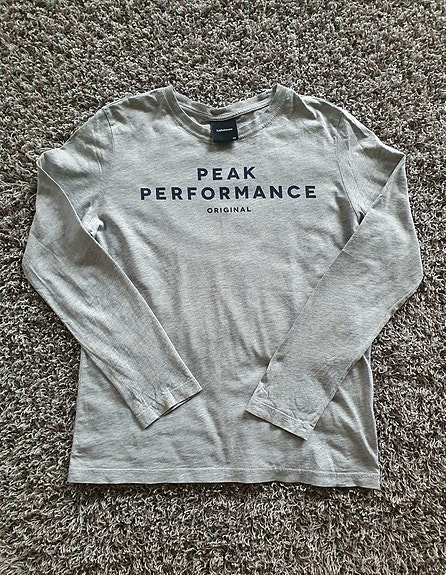 Peak Performancen ohut pitkähihainen collegepaita pojille (Koko 150cm)