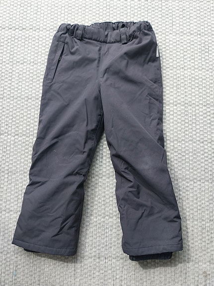 Mustat Reima toppahousut 122 cm