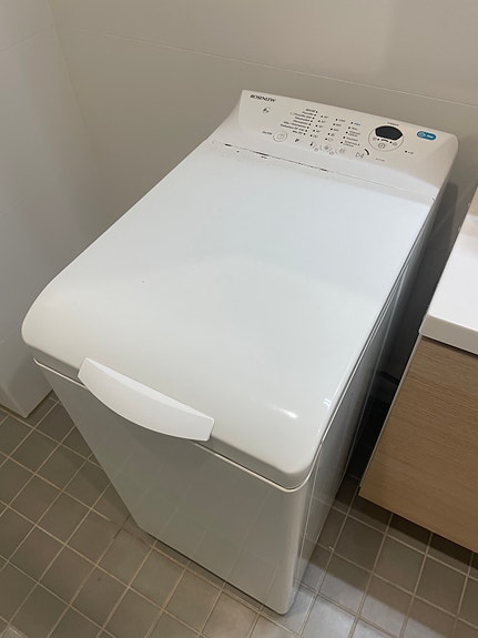Päältä täytettävä pesukone