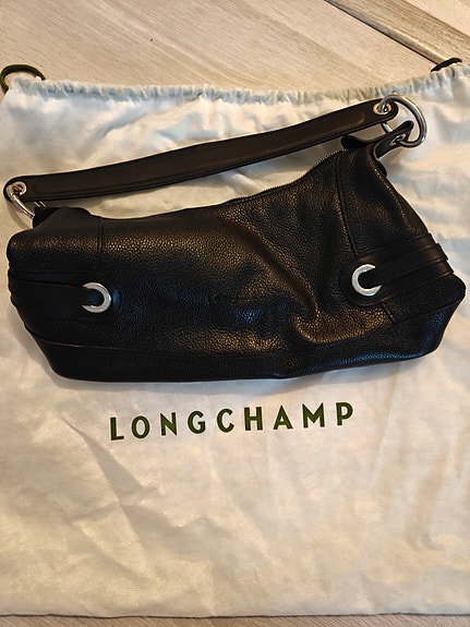 Musta Longchamp käsilaukku