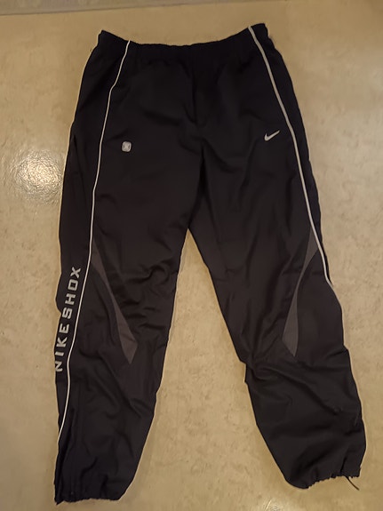 Nike tuulihousut L