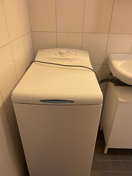 Päältä täytettävä pesukone