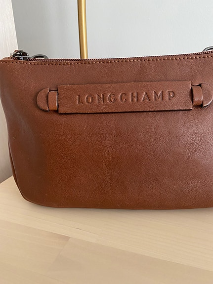 Aito Longchamp pikkulaukku