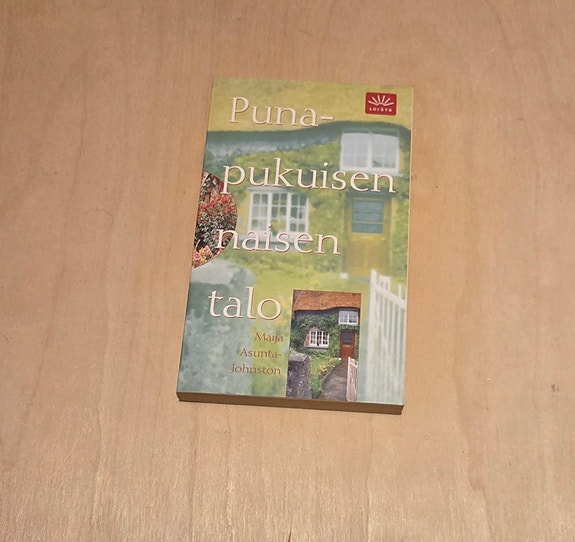 Punapukuisen naisen talo, Maija Asunta-Johnston