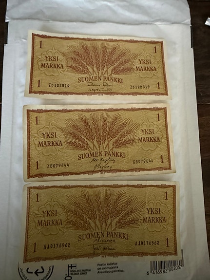Suomen markka -setelit ja 50 pennin kolikot