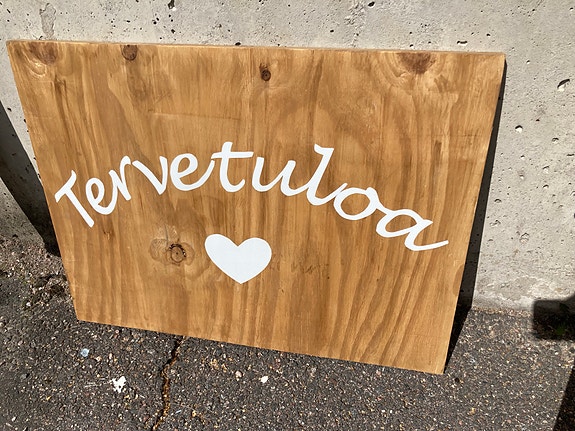 Tervetuloa -kyltti