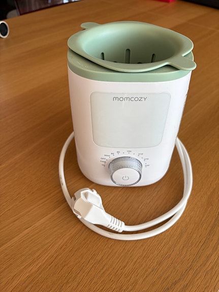 Momcozy tuttipullon lämmitin