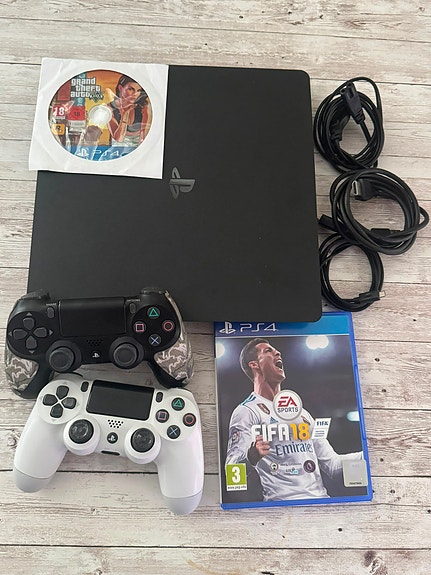 PlayStation 4 Slim 500GB (Malli CUH-2216A) + 2 ohjainta & 2 peliä