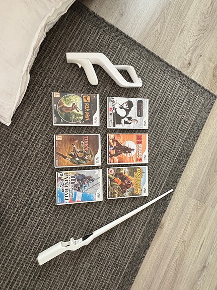 Nintendo Wii pelipaketti ja ohjainlisäosia