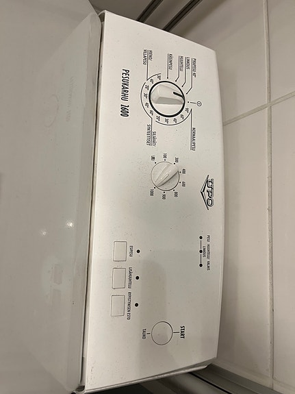 UPO päältä täytettävä pesukone valkoinen
