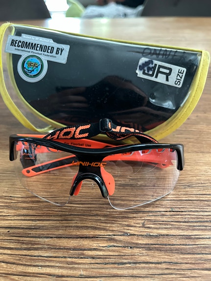 Unihoc salibandy suojalasit JR-koko musta/oranssi