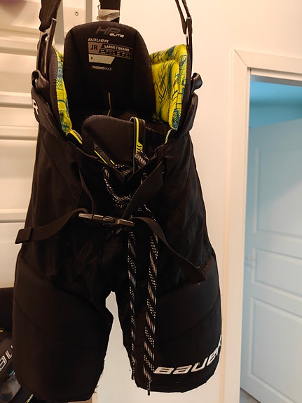 Bauer HP Elite JR jääkiekkohousut koko L musta